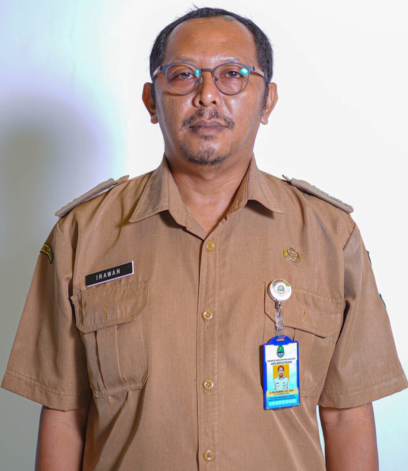 IRA IRAWAN,S.IP.,M,Si.